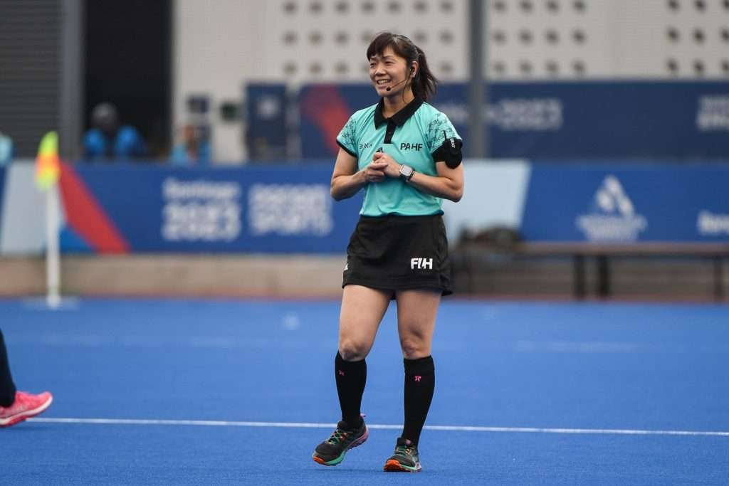 2023 1028 W USA ARG 139a3 1 - FIH: Umpire Yamada Celebrates Golden Whistle on Final Day of Pan American Games - It was a picture-perfect moment for Japan’s Emi Yamada who umpired her 100th international game on 4 November at the XIX Pan American Games in Santiago at Estadio Nacional de Chile. Known as the “Golden Whistle” achievement, Yamada becomes just the fourth Japanese official to reach the milestone following women’s umpires Naomi Kato (1997), Kazuko Yasueda (2002) and Chieko Soma (2012).
