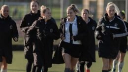 Buckingham HC warming up before their match with Clifton Robinsons - Image by Graeme Wilcockson