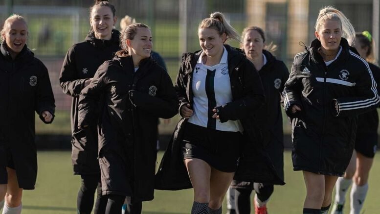 Buckingham HC warming up before their match with Clifton Robinsons - Image by Graeme Wilcockson