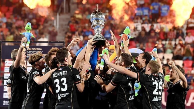 FU22301298141 - World Cup: Germany Secure Third World Cup Gold - Germany on Sunday clinched their third men's Hockey World Cup title after beating defending champions Belgium 5-4 in shootout in Bhubaneshwar.&nbsp;Trailing 0-2 at the break, Germany scored three goal in the second-half to take a 3-2 lead. However, Belgium equallised in the dying embers of normal time from a penalty corner. In the penalty shootout, Germany eventually prevailed 5-4.