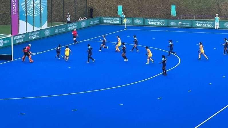 india indian womens team goes down 0 4 against china in the semi final of 19th asian games hangzhou 2022 651eaa0f8c317 - India: Indian Women’s Team goes down 0-4 against China in the Semi-Final of 19th Asian Games Hangzhou 2022 - The match kicked off with China swiftly infiltrating deep into India's territory, immediately challenging India's defense. This early offensive move resulted in China earning the first Penalty Corner of the game, but India's Captain and goalkeeper, Savita, came up with a crucial save to prevent China from taking the lead. Simultaneously, the Indian team attempted to take command of the game by applying pressure on China and executing rapid passes. Nonetheless, China continued to display their attacking prowess, maintaining pressure on India, who defended admirably to keep China at bay. 