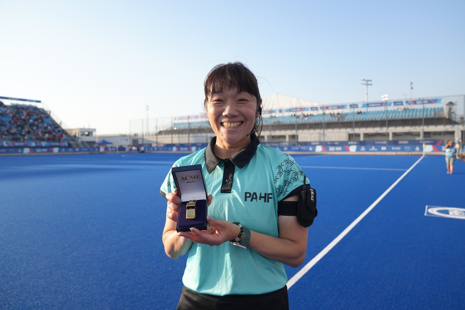 FIH: Umpire Yamada Celebrates Golden Whistle on Final Day of Pan American Games 222 DSC04912 scaled - FIH: Umpire Yamada Celebrates Golden Whistle on Final Day of Pan American Games - It was a picture-perfect moment for Japan’s Emi Yamada who umpired her 100th international game on 4 November at the XIX Pan American Games in Santiago at Estadio Nacional de Chile. Known as the “Golden Whistle” achievement, Yamada becomes just the fourth Japanese official to reach the milestone following women’s umpires Naomi Kato (1997), Kazuko Yasueda (2002) and Chieko Soma (2012).