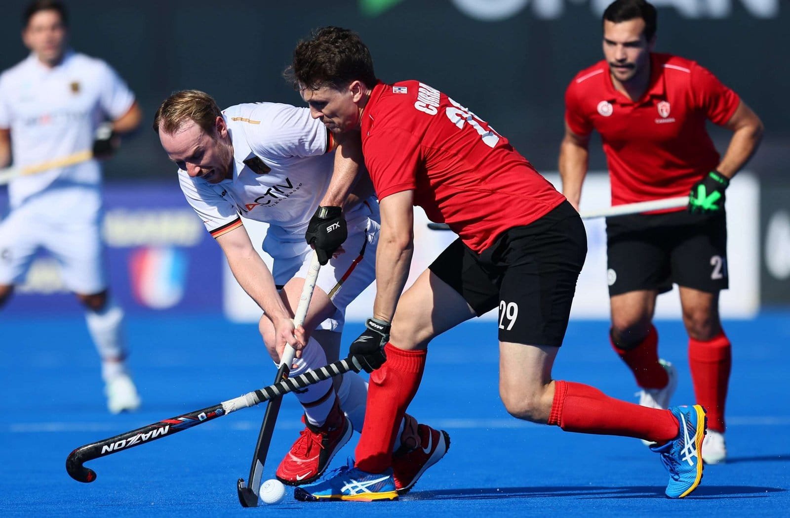 canada germany defeats canada on opening afternoon in oman 65a52574626eb - Canada: Germany defeats Canada on opening afternoon in Oman - In an opening day face off at the FIH Olympic Qualifier tournament in Oman, Canada encountered a daunting challenge against the fifth-ranked Germany, ultimately succumbing to a sound defeat. From the onset, it was evident that the 17th-ranked Canadian team faced an uphill battle. Germany wasted no time asserting dominance, securing the goal advantage by notching three goals in the opening quarter. The early onslaught reflected Germany’s control over the game, with a grip on possession.
