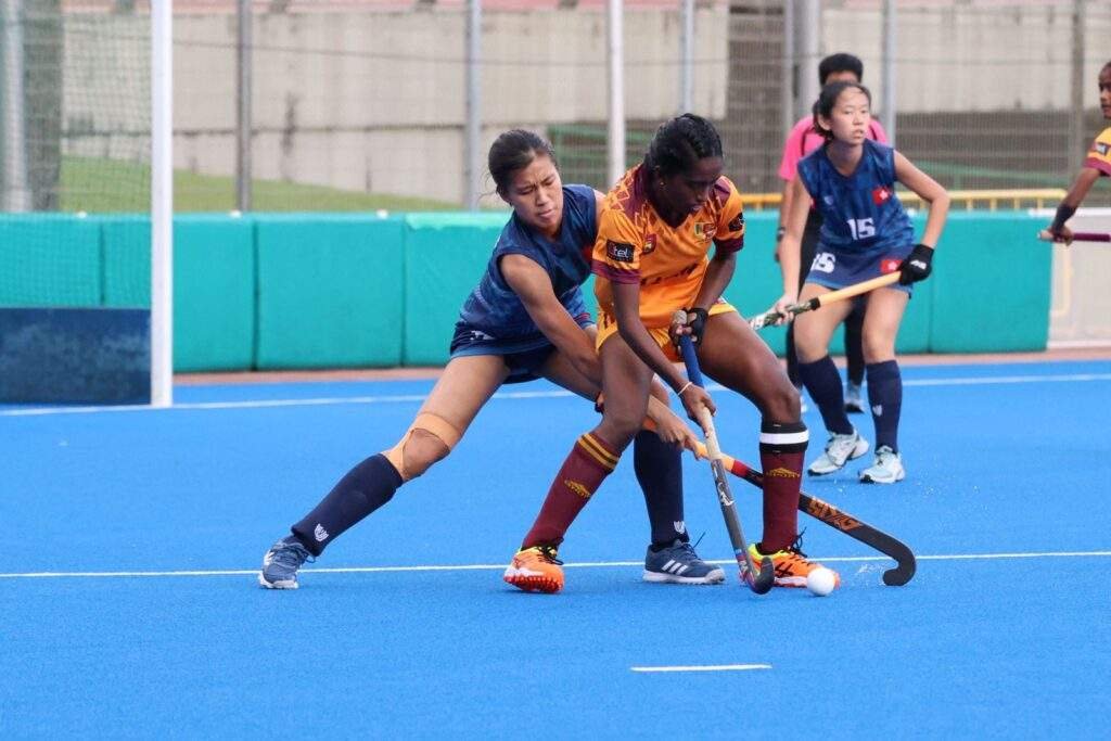 asia opening day womens junior ahf cup 2024 667118399bae3 - Asia: Opening day Women’s Junior AHF Cup 2024 - Singapore, June 15, 2024 — In an exhilarating encounter, the Sri Lanka women’s junior field hockey team emerged victorious with a 3-2 win over Hong Kong China in the Women’s Junior AHF Cup 2024. The match, held at the Seng Kang Hockey Stadium in Singapore, showcased the tenacity and skill of both teams, providing an exciting spectacle for the fans.The match started with both teams demonstrating strong offensive and defensive strategies. Hong Kong China took the lead in the 10th minute with a goal from forward Emily Chan, who found the back of the net after a swift attack. Sri Lanka responded quickly, equalizing in the 18th minute through midfielderThe 3-2 win for Sri Lanka over Hong Kong China in the Women’s Junior AHF Cup 2024 highlights the competitive spirit and skill of both teams