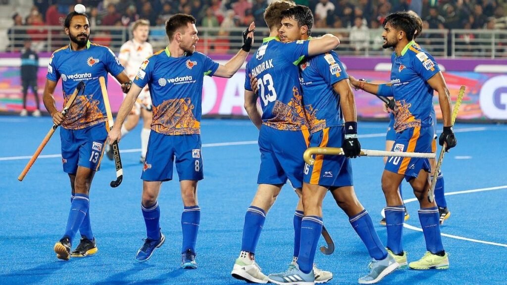 Kalinger lancers celebrate after scoring a goal.  Bandurak centre with Hendrickx